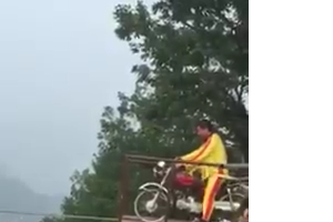 Omg - A man rides Bike  on a rope
