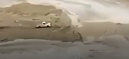 Truck Narrowly Escapes Flash Flood Waters in Saudi Arabia